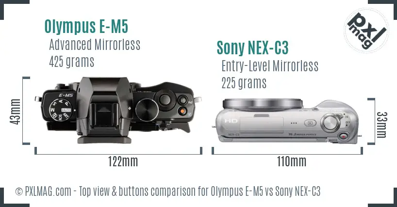 Olympus E-M5 vs Sony NEX-C3 top view buttons comparison