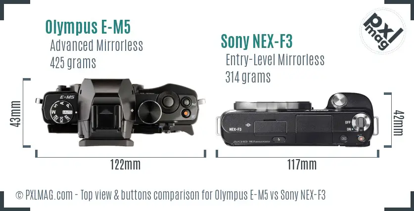 Olympus E-M5 vs Sony NEX-F3 top view buttons comparison