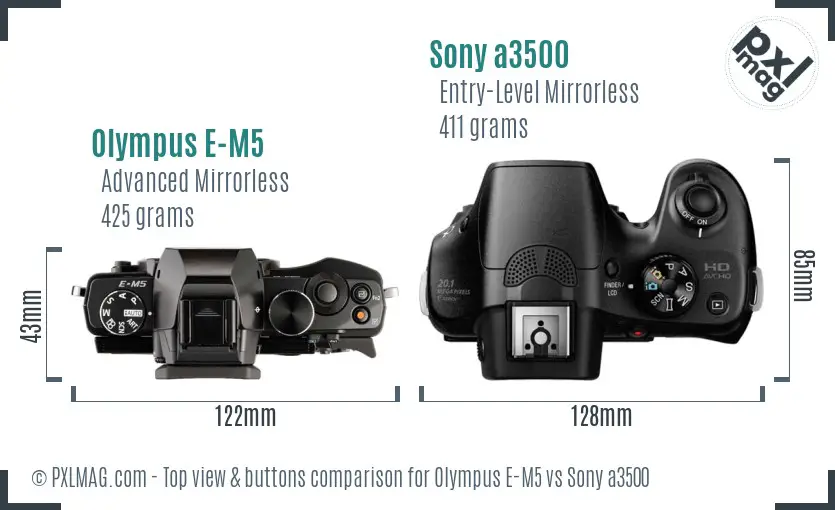 Olympus E-M5 vs Sony a3500 top view buttons comparison Olympus E-M5 vs Sony a3500 top view buttons comparison
