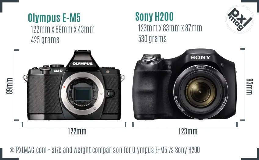 Olympus E-M5 vs Sony H200 size comparison