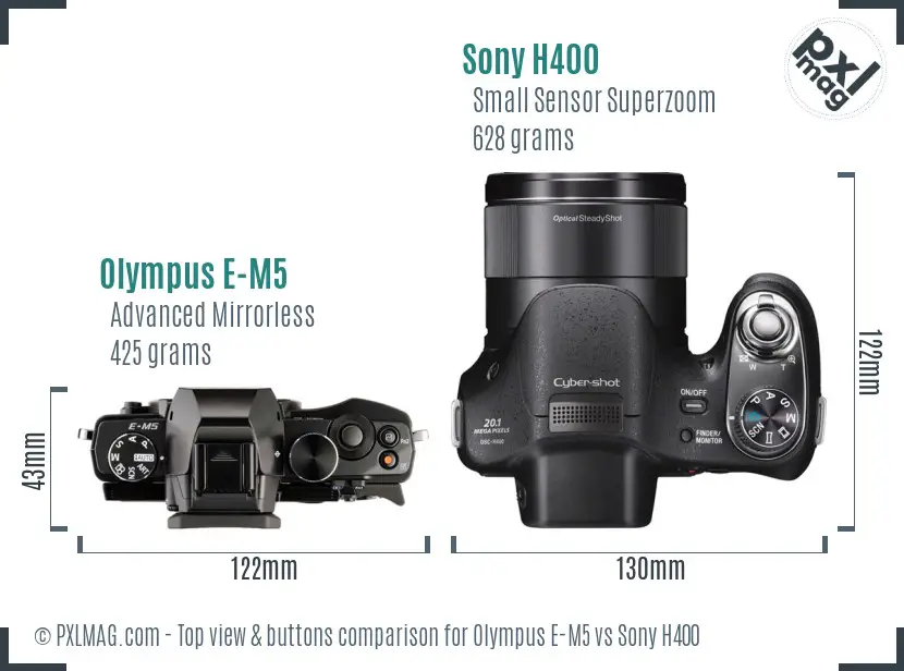 Olympus E-M5 vs Sony H400 top view buttons comparison