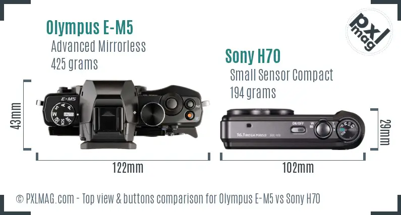 Olympus E-M5 vs Sony H70 top view buttons comparison