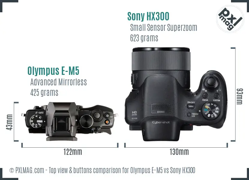 Olympus E-M5 vs Sony HX300 top view buttons comparison