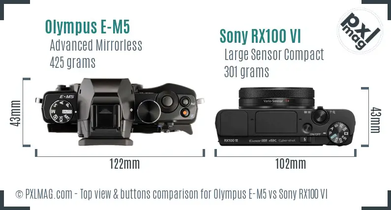 Olympus E-M5 vs Sony RX100 VI top view buttons comparison Olympus E-M5 vs Sony RX100 VI top view buttons comparison