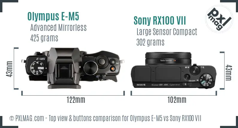 Olympus E-M5 vs Sony RX100 VII top view buttons comparison Olympus E-M5 vs Sony RX100 VII top view buttons comparison
