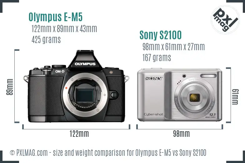 Olympus E-M5 vs Sony S2100 size comparison Olympus E-M5 vs Sony S2100 size comparison