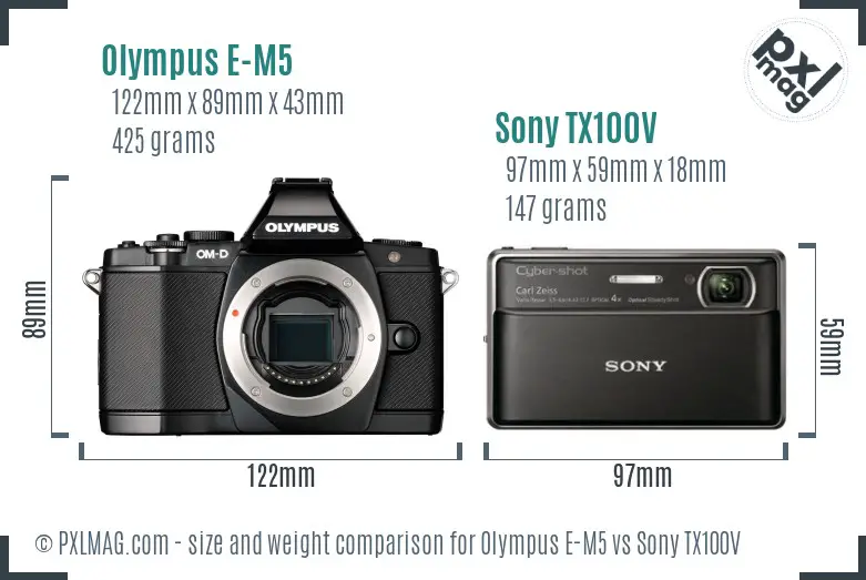 Olympus E-M5 vs Sony TX100V size comparison Olympus E-M5 vs Sony TX100V size comparison
