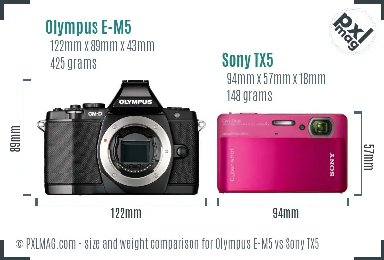 Olympus E-M5 vs Sony TX5 size comparison Olympus E-M5 vs Sony TX5 size comparison