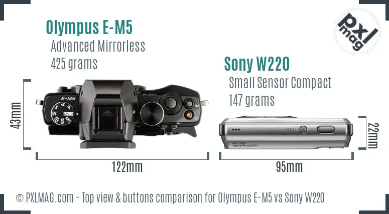 Olympus E-M5 vs Sony W220 top view buttons comparison