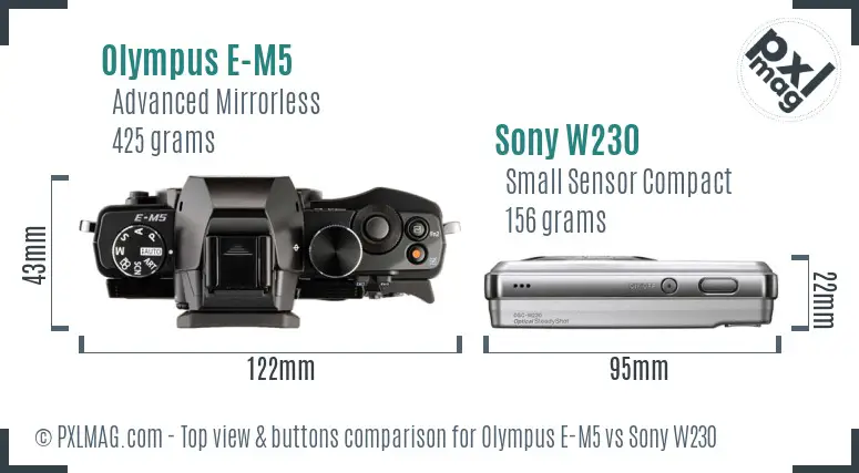 Olympus E-M5 vs Sony W230 top view buttons comparison