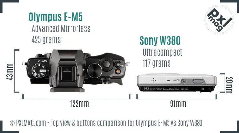 Olympus E-M5 vs Sony W380 top view buttons comparison