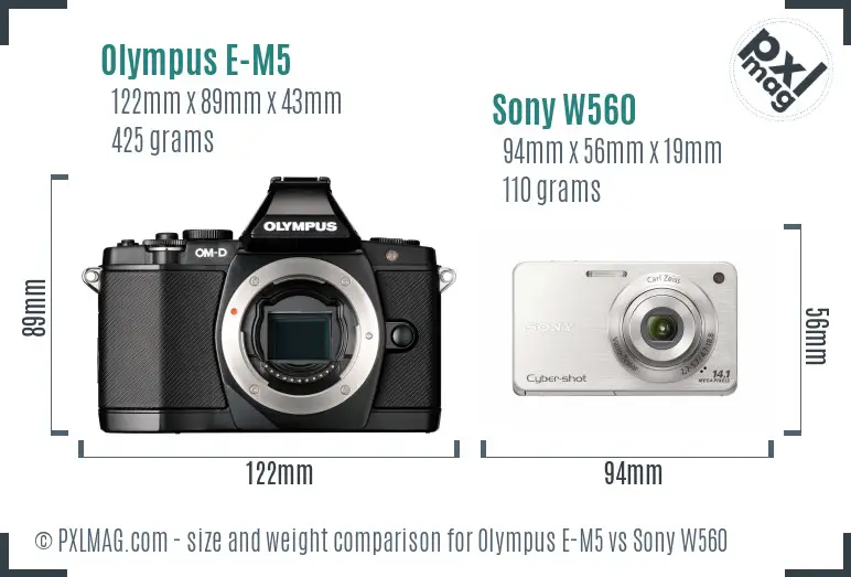 Olympus E-M5 vs Sony W560 size comparison