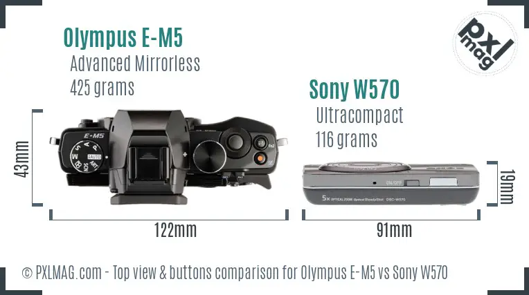 Olympus E-M5 vs Sony W570 top view buttons comparison