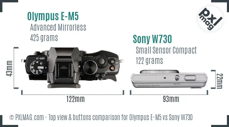 Olympus E-M5 vs Sony W730 top view buttons comparison