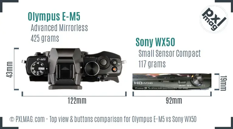 Olympus E-M5 vs Sony WX50 top view buttons comparison