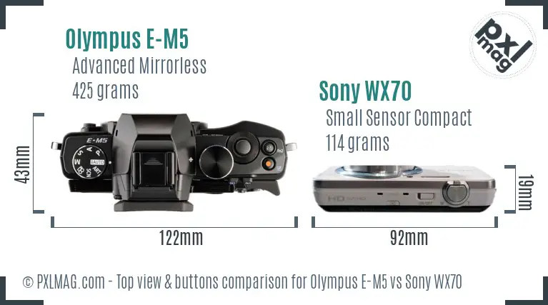 Olympus E-M5 vs Sony WX70 top view buttons comparison