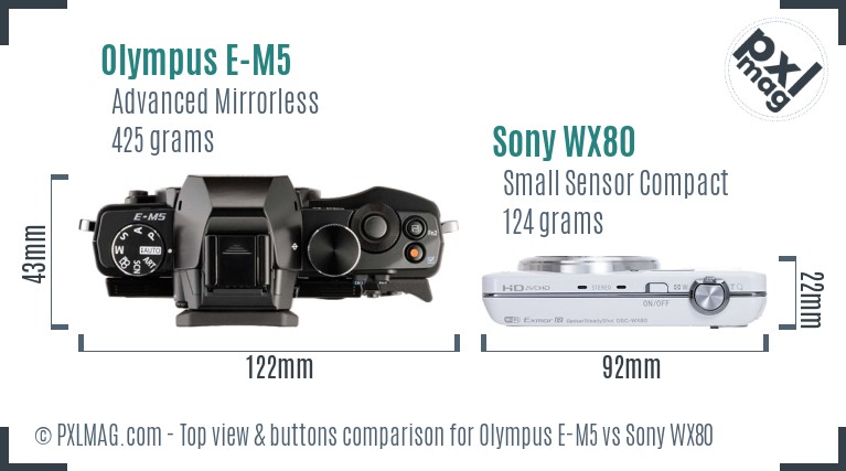 Olympus E-M5 vs Sony WX80 top view buttons comparison