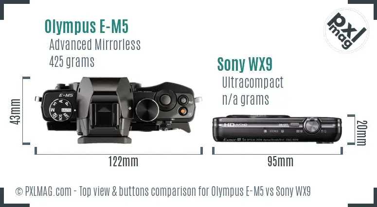 Olympus E-M5 vs Sony WX9 top view buttons comparison