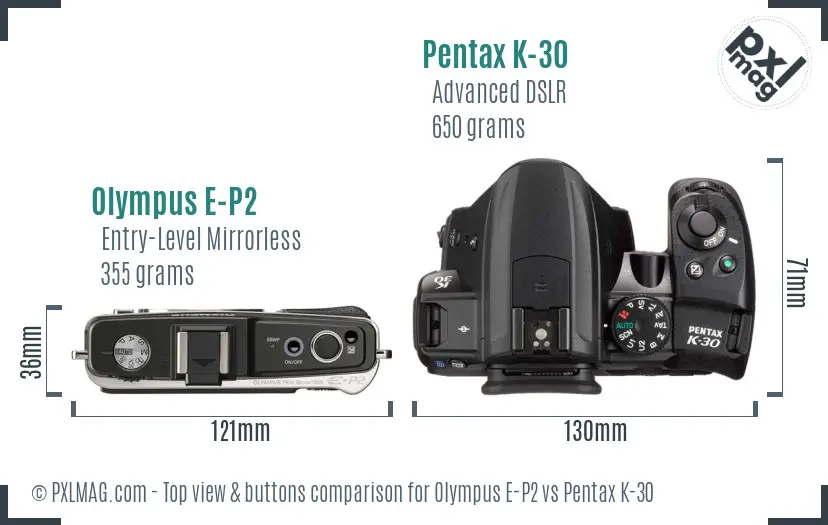 Olympus E-P2 vs Pentax K-30 top view buttons comparison