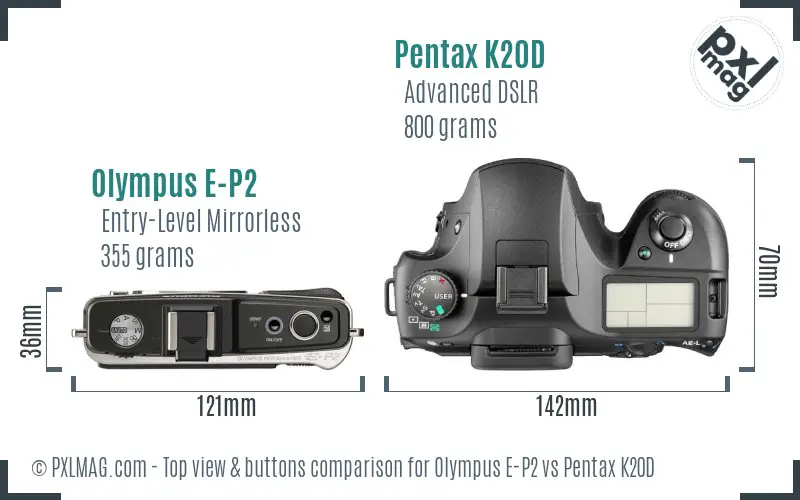 Olympus E-P2 vs Pentax K20D top view buttons comparison