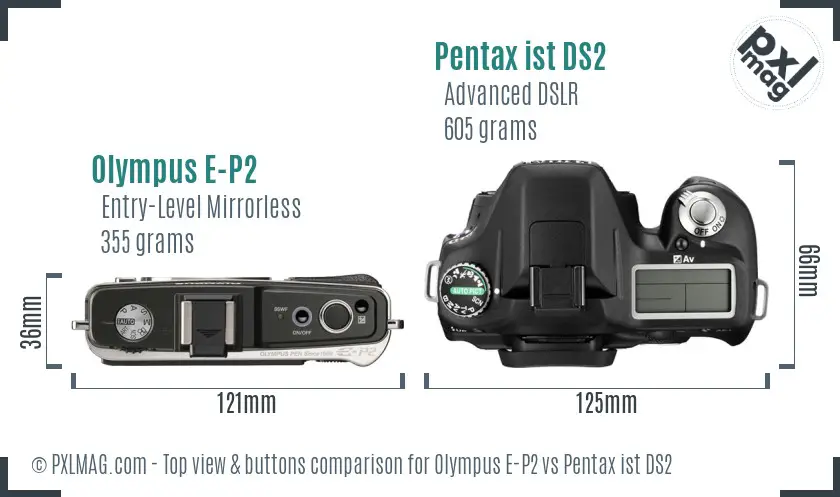 Olympus E-P2 vs Pentax ist DS2 top view buttons comparison