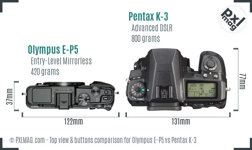 Olympus E-P5 vs Pentax K-3 top view buttons comparison