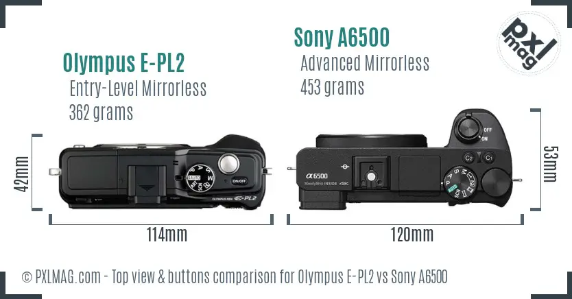Olympus E-PL2 vs Sony A6500 top view buttons comparison