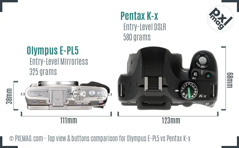Olympus E-PL5 vs Pentax K-x top view buttons comparison