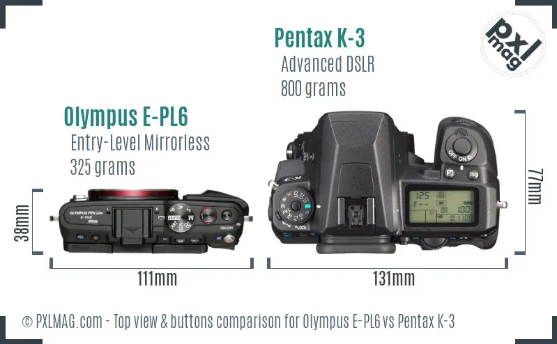 Olympus E-PL6 vs Pentax K-3 top view buttons comparison
