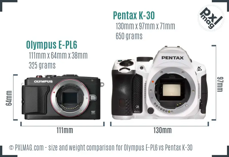Olympus E-PL6 vs Pentax K-30 size comparison