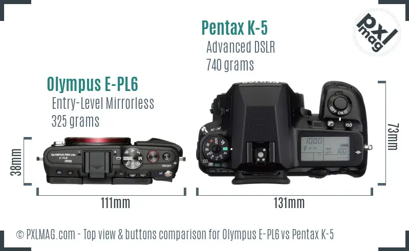 Olympus E-PL6 vs Pentax K-5 top view buttons comparison