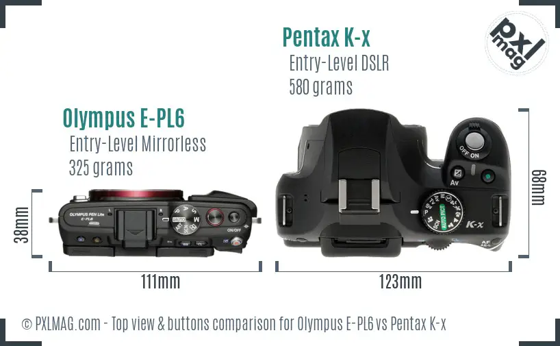 Olympus E-PL6 vs Pentax K-x top view buttons comparison
