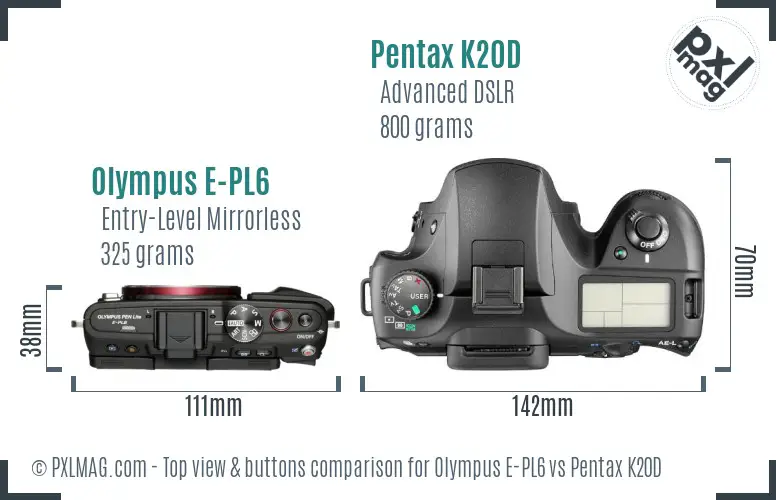 Olympus E-PL6 vs Pentax K20D top view buttons comparison