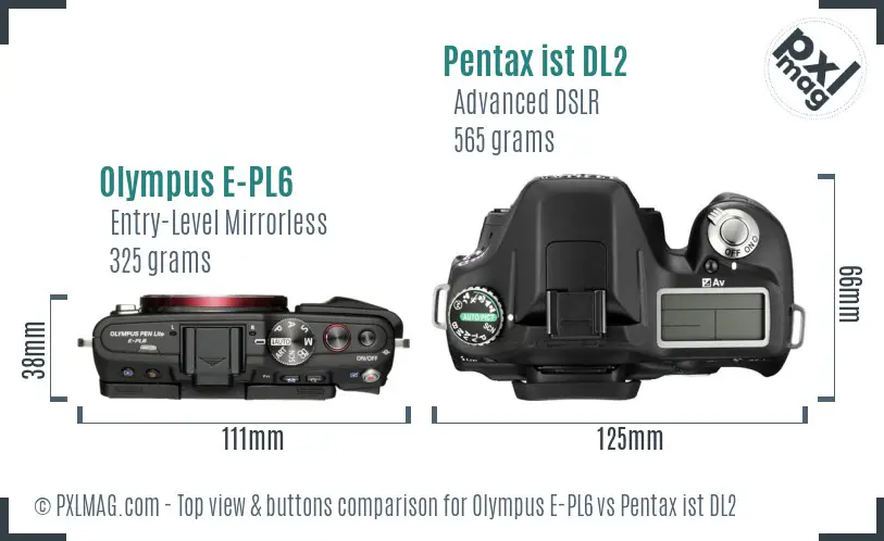 Olympus E-PL6 vs Pentax ist DL2 top view buttons comparison