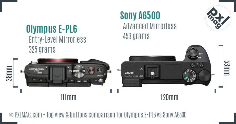 Olympus E-PL6 vs Sony A6500 top view buttons comparison