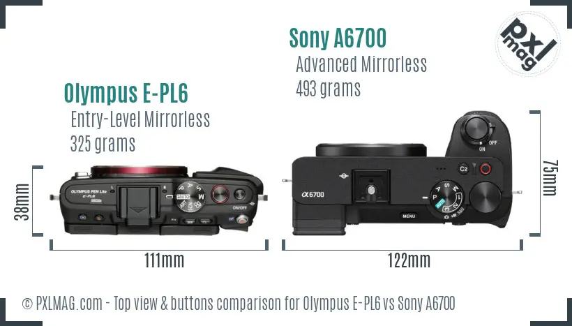 Olympus E-PL6 vs Sony A6700 top view buttons comparison Olympus E-PL6 vs Sony A6700 top view buttons comparison