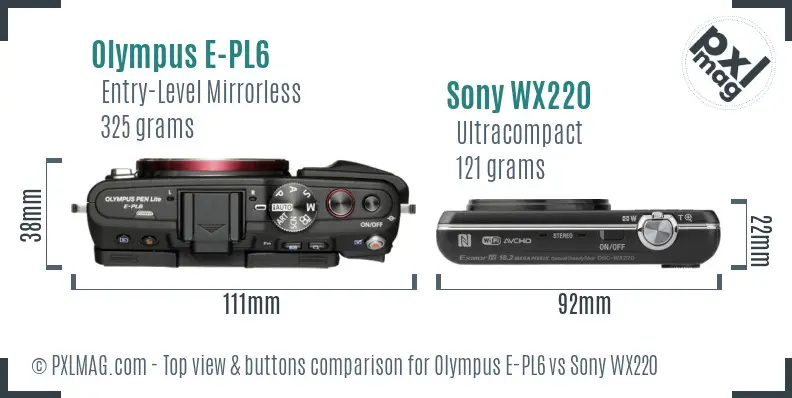 Olympus E-PL6 vs Sony WX220 top view buttons comparison