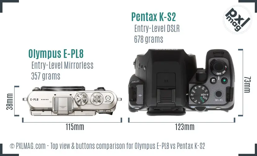 Olympus E-PL8 vs Pentax K-S2 top view buttons comparison