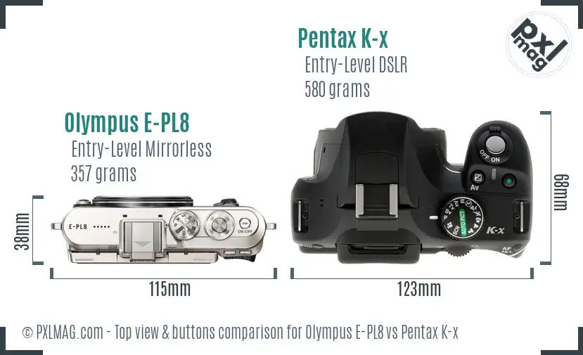 Olympus E-PL8 vs Pentax K-x top view buttons comparison