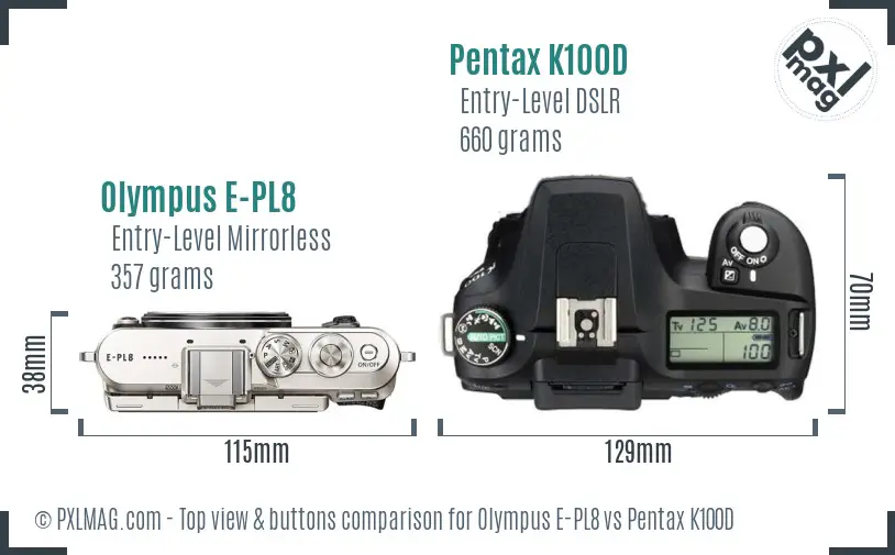 Olympus E-PL8 vs Pentax K100D top view buttons comparison