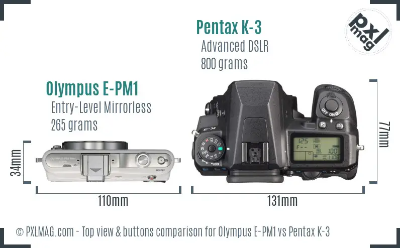 Olympus E-PM1 vs Pentax K-3 top view buttons comparison