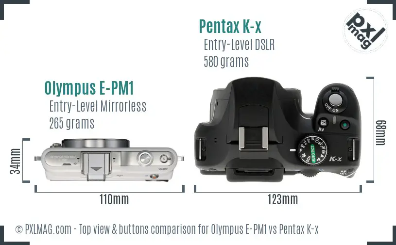 Olympus E-PM1 vs Pentax K-x top view buttons comparison