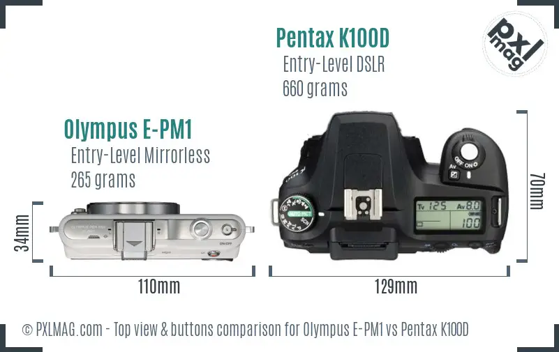 Olympus E-PM1 vs Pentax K100D top view buttons comparison