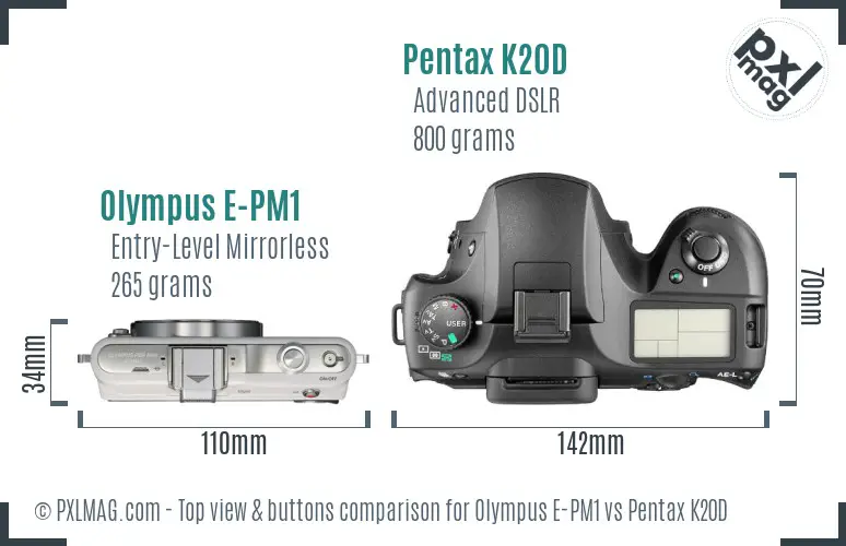 Olympus E-PM1 vs Pentax K20D top view buttons comparison
