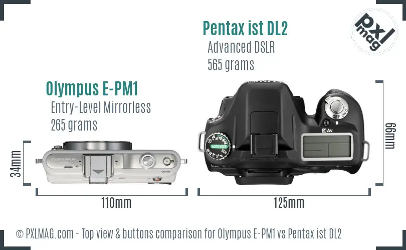 Olympus E-PM1 vs Pentax ist DL2 top view buttons comparison