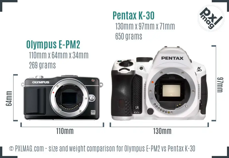 Olympus E-PM2 vs Pentax K-30 size comparison