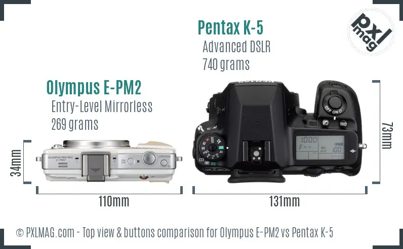 Olympus E-PM2 vs Pentax K-5 top view buttons comparison