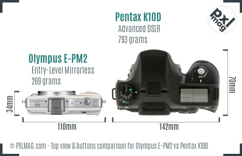 Olympus E-PM2 vs Pentax K10D top view buttons comparison