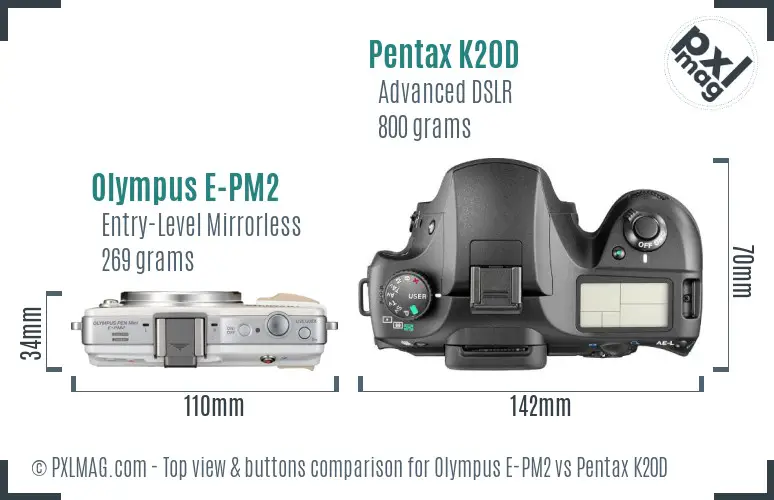 Olympus E-PM2 vs Pentax K20D top view buttons comparison