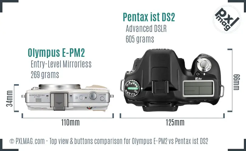 Olympus E-PM2 vs Pentax ist DS2 top view buttons comparison
